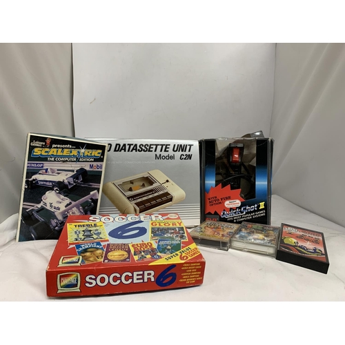 416 - A BOXED COMMODORE 64C COMPUTER BUNDLE TO INCLUDE CASSETTE UNIT, JOYSTICK, HOLLYWOOD GAMES SUCH AS RA... 