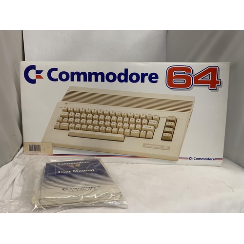 416 - A BOXED COMMODORE 64C COMPUTER BUNDLE TO INCLUDE CASSETTE UNIT, JOYSTICK, HOLLYWOOD GAMES SUCH AS RA... 