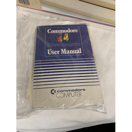 416 - A BOXED COMMODORE 64C COMPUTER BUNDLE TO INCLUDE CASSETTE UNIT, JOYSTICK, HOLLYWOOD GAMES SUCH AS RA... 