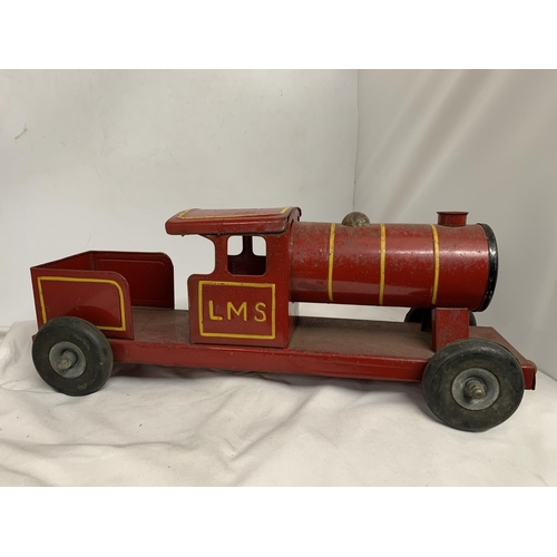 421 - A LARGE VINTAGE TRIANG RED TIN PLATE STEAM TRAIN, LENGTH 51CM, HEIGHT 19CM