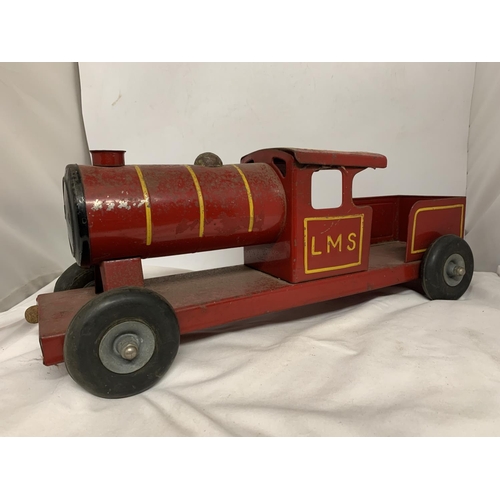 421 - A LARGE VINTAGE TRIANG RED TIN PLATE STEAM TRAIN, LENGTH 51CM, HEIGHT 19CM