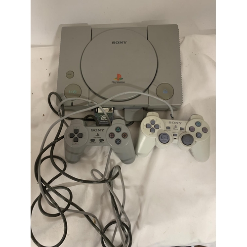 427 - A BOXED SONY PLAYSTATION ONE DUAL SHOCK CONSOLE WITH TWO CONTROLLERS