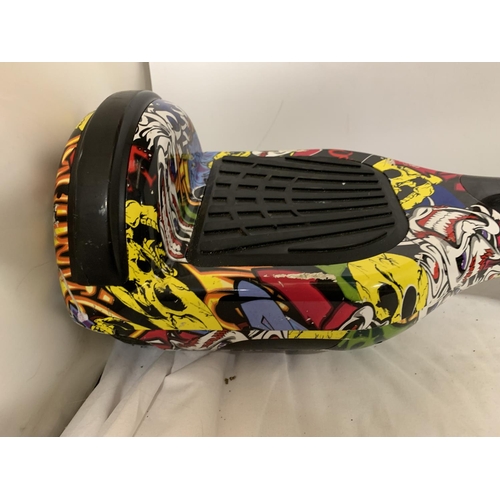 430 - AN ELECTRIC HOVERBOARD WITH SKULL DESIGN