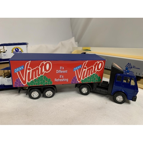 438 - A QUANTITY OF BOXED VEHICLES TO INCLUDE LORRIES, MONSTER TRUCKS, LIMITED EDITION ADVERTISING VANS