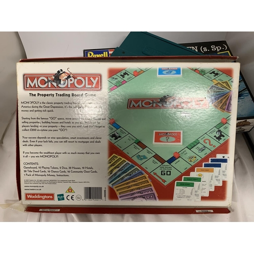 448 - TWO PRECISION MODEL KITS OF TANKS TOGETHER WITH A VINTAGE MONOPOLY AND A SCRABBLE GAME