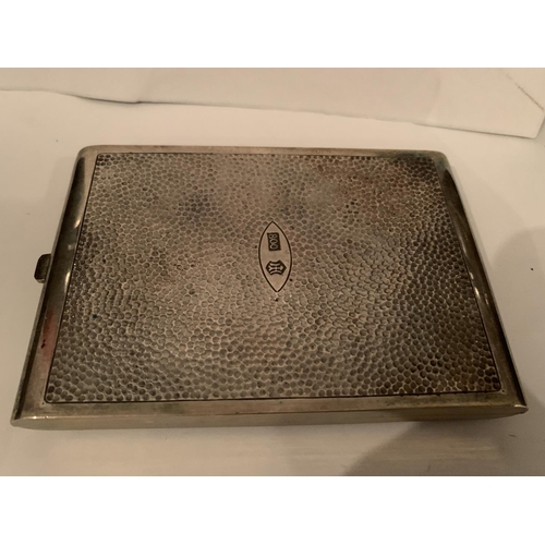 70 - A DECORATIVE MARKED 800 SILVER CIGARETTE CASE