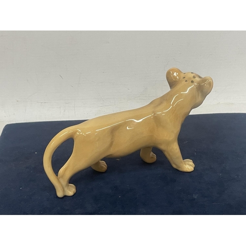 916 - A BESWICK LIONESS