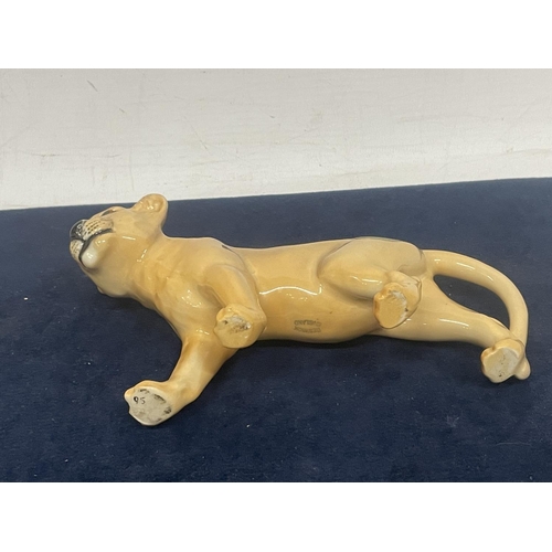 916 - A BESWICK LIONESS