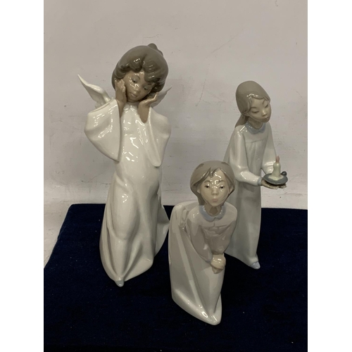 981 - THREE LLADRO FIGURES TO INCLUDE AN ANGEL AND TWO GIRLS