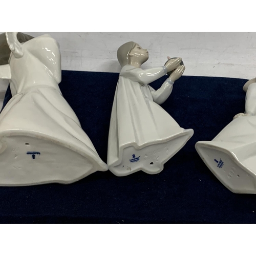 981 - THREE LLADRO FIGURES TO INCLUDE AN ANGEL AND TWO GIRLS