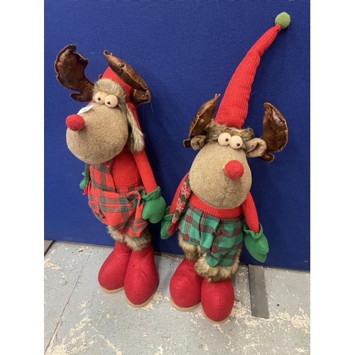 1474 - A BOY AND GIRL CHRISTMAS REINDEER FIGURES