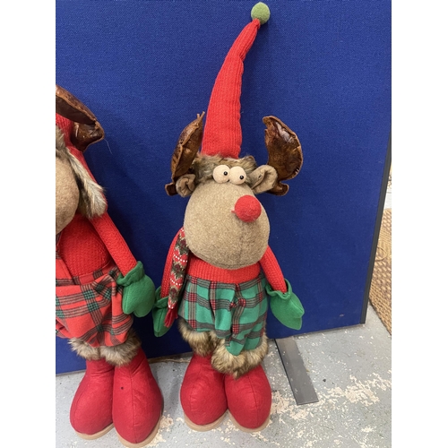 1474 - A BOY AND GIRL CHRISTMAS REINDEER FIGURES