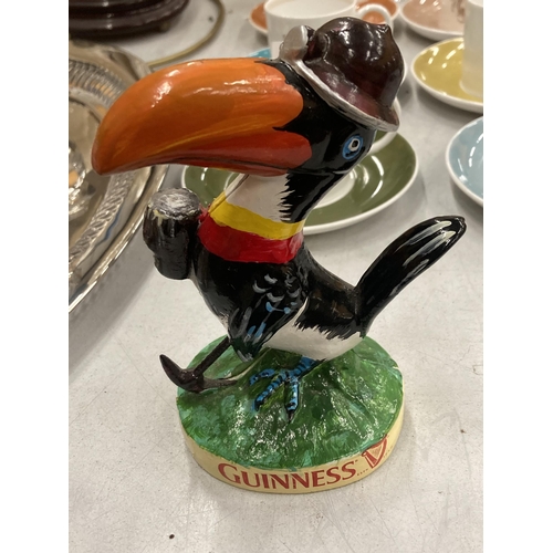 1202 - A PAINTED CAST GUINNESS TOUCAN FIGURE