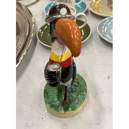 1202 - A PAINTED CAST GUINNESS TOUCAN FIGURE