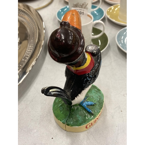 1202 - A PAINTED CAST GUINNESS TOUCAN FIGURE