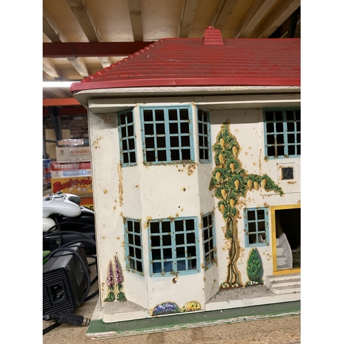 1169 - A VINTAGE METAL DOLL'S HOUSE WITH FURNITURE