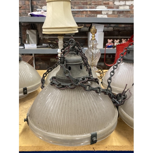 1322 - A SET OF FOUR HOLOPHANE LAMPS WITH METAL FITTINGS AND CHAIN