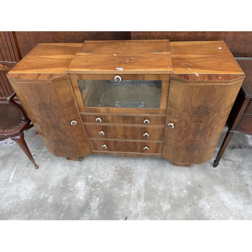 2505 - A WALNUT ART DECO COCKTAIL SIDEBOARD WITH MIRRORED DROP-DOWN FRONT, TWO CUPBOARDS AND THREE DRAWERS,... 