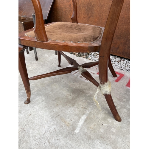 2506 - AN EDWARDIAN MAHOGANY AND INLAID SPINDLE BACK ELBOW CHAIR ON FRONT CABRIOLE LEGS