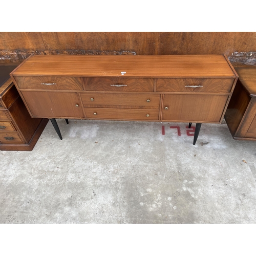 2514 - A RETRO TEAK SIDEBOARD ON BLACK TAPERING LEGS ENCLOSING FIVE DRAWERS AND TWO CUPBOARDS, 72