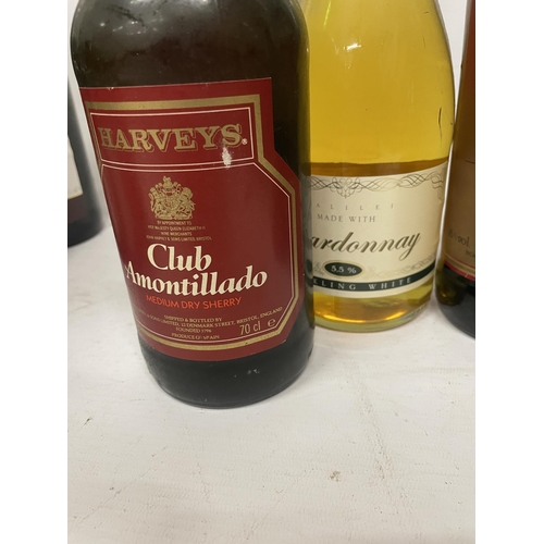 559A - FOUR MIXED BOTTLES - HARVEYS CLUB AMONTILLADO, DUBONNET ETC