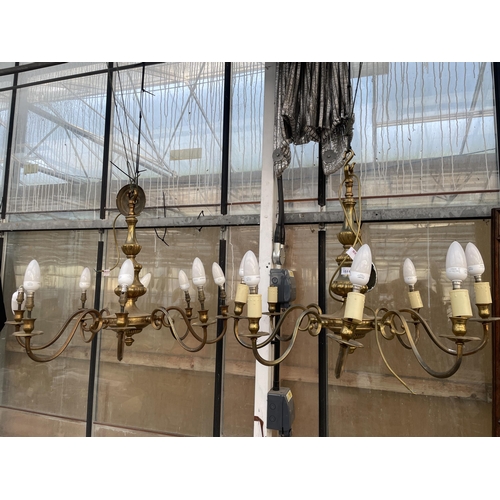 1511 - A PAIR OF EIGHT BRANCH BRASS CEILING LIGHT CHANDELIERS