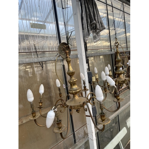 1511 - A PAIR OF EIGHT BRANCH BRASS CEILING LIGHT CHANDELIERS