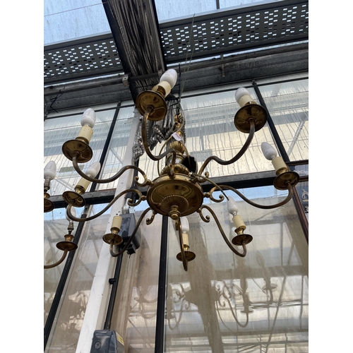 1511 - A PAIR OF EIGHT BRANCH BRASS CEILING LIGHT CHANDELIERS