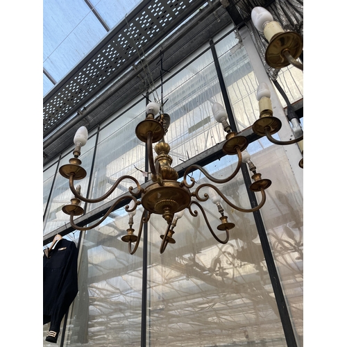 1511 - A PAIR OF EIGHT BRANCH BRASS CEILING LIGHT CHANDELIERS