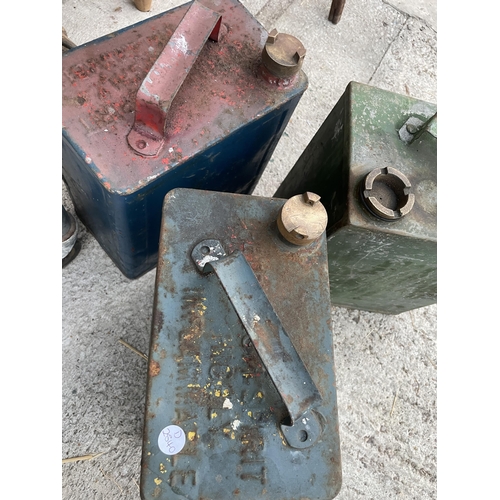 1558 - THREE VARIOUS VINTAGE FUEL CANS WITH BRASS CAPS