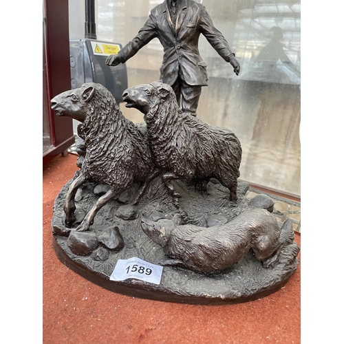 1589 - A BRONZED COLD CAST FIGURE OF A FARMER WITH SHEEP AND A SHEEP DOG