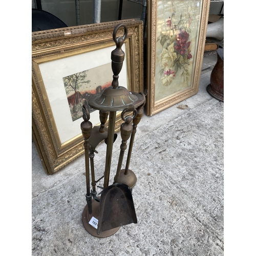 1601 - A BRASS COMPANION SET WITH STAND