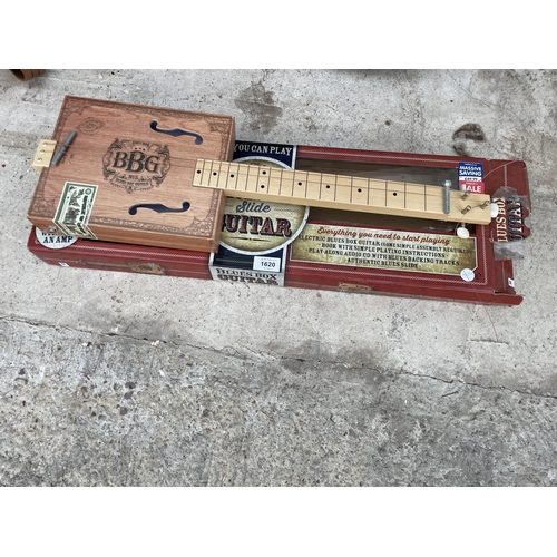 AN ELECTRIC BLUES BOX SLIDE GUITAR