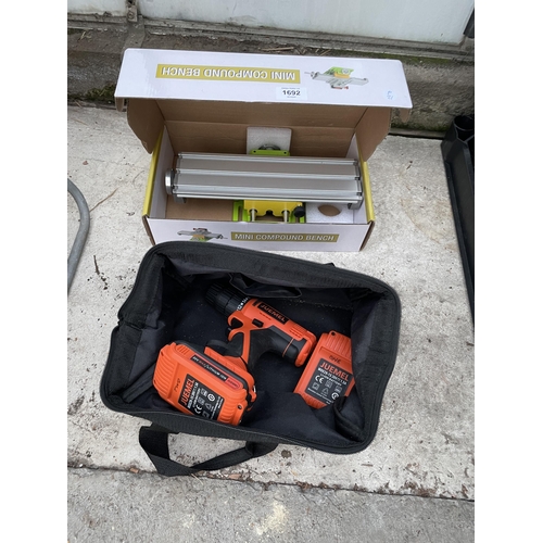 1692 - AN AS NEW BOXED MINI COMPOUND BENCH AND A JUEMEL BATTERY DRILL WITH TWO BATTERIES