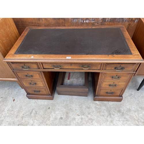 2515 - A LATE VICTORIAN MAHOGANY TWIN PEDESTAL DESK ENCLOSING NINE DRAWERS WITH INSET LEATHER TOP, 48 X 25