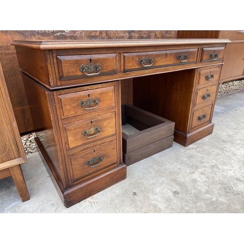 2515 - A LATE VICTORIAN MAHOGANY TWIN PEDESTAL DESK ENCLOSING NINE DRAWERS WITH INSET LEATHER TOP, 48 X 25