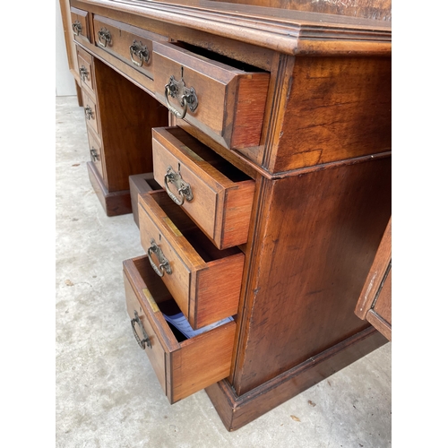 2515 - A LATE VICTORIAN MAHOGANY TWIN PEDESTAL DESK ENCLOSING NINE DRAWERS WITH INSET LEATHER TOP, 48 X 25