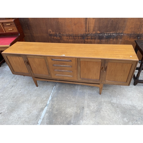 2520 - A G-PLAN RETRO TEAK SIDEBOARD ENCLOSING FOUR DRAWERS AND FOUR CUPBOARDS ON OPEN BASE, 84