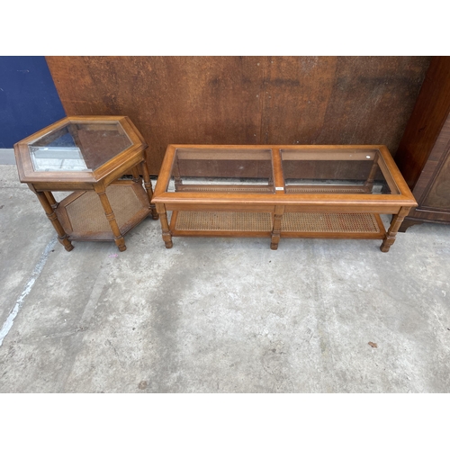 2533 - A TWO TIER COFFEE TABLE WITH INSET GLASS TOP AND CANE LOWER SHELF, 50 X 21