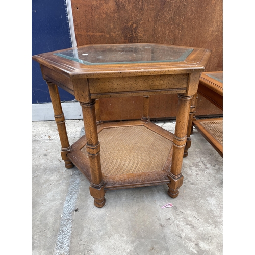 2533 - A TWO TIER COFFEE TABLE WITH INSET GLASS TOP AND CANE LOWER SHELF, 50 X 21