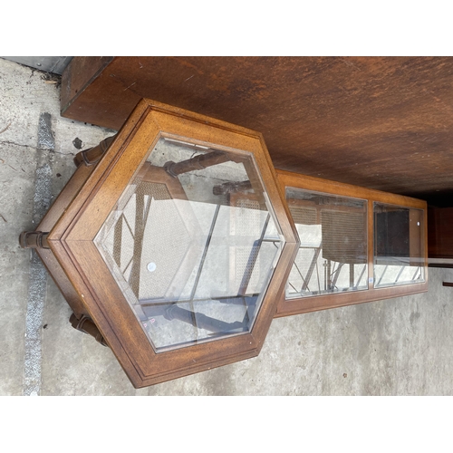 2533 - A TWO TIER COFFEE TABLE WITH INSET GLASS TOP AND CANE LOWER SHELF, 50 X 21