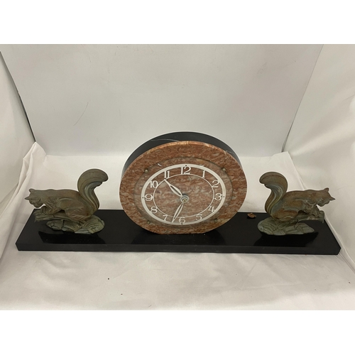 25 - A CONTINENTAL ART DECO CLOCK ON A PLINTH WITH SQUIRREL GARNITURES 23