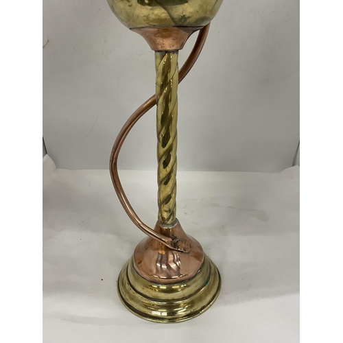 27 - A VINTAGE OIL LAMP WITH MABER COLOURED GLASS SHADE, GLASS FUNNEL AND A BRASS AND COPPER TWISTED BASE