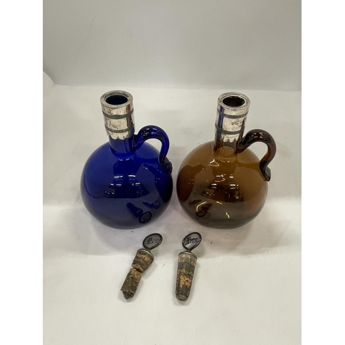 31 - TWO ANTIQUE COLOURED GLASS DECANTERS/FLAGONS WITH SILVER PLATED COLLARS, PORT AND RUM CORKS
