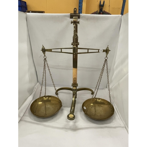32 - A PAIR OF VINTAGE BRASS BALANCE SCALES
