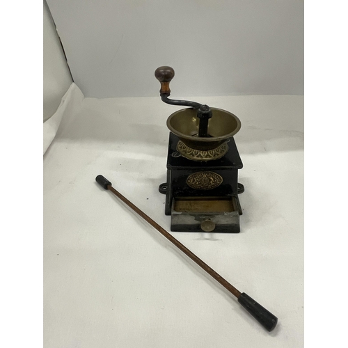 33 - AN A.KENDRICK & SONS PATENT COFFEE MILL WITH A BRASS BOWL STYLE TOP AND A TURNING HANDLE. THERE IS A... 