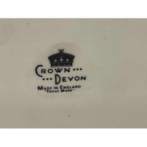 36 - A CROWN DEVON BLACK AND WHITE WHISKY ADVERTISING FIGURE