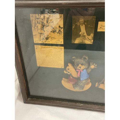 6 - A GLASS FRONTED WOODEN CASED DISPLAY BOX WITH TEDDIES AND THEIR STORIES - A HISTORY OF THE STEIFF FA... 
