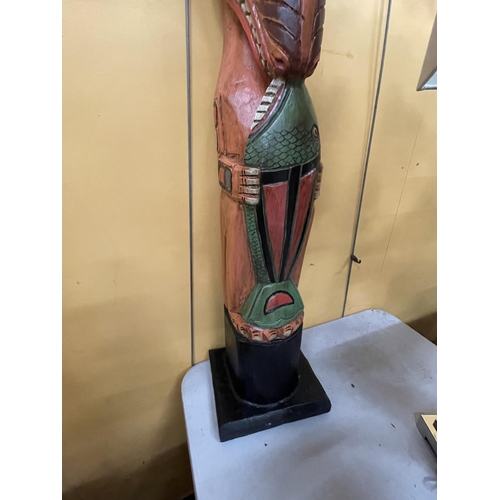 69 - A LARGE WOODEN TOTEM POLE FIGURE