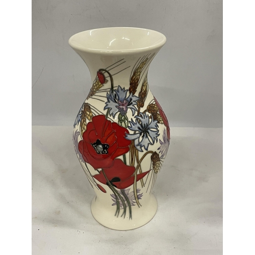 84 - A LARGE MOORCROFT POPPY TRIAL VASE HEIGHT 12